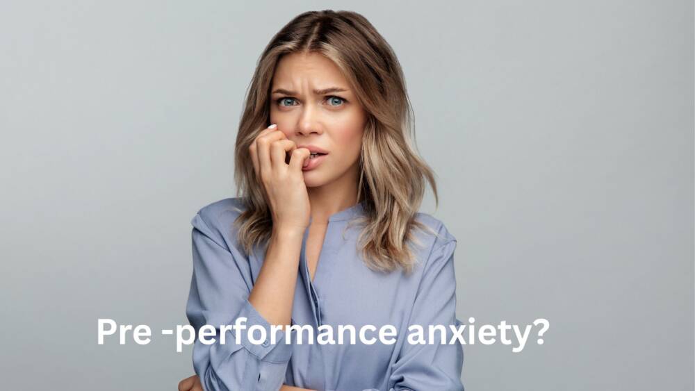 Woman with anxious face expression nervously biting her nails